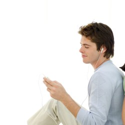 Young Man Listening to Music with Headphones